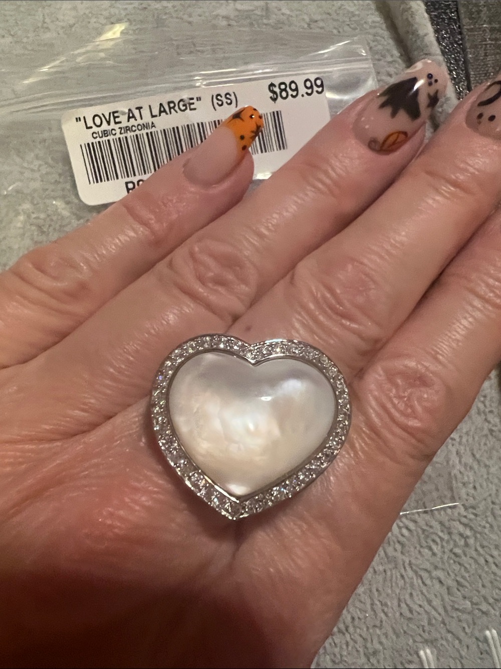 Heart-Shaped Mother-of-Pearl Ring with Silver Cubic Zirconia Halo